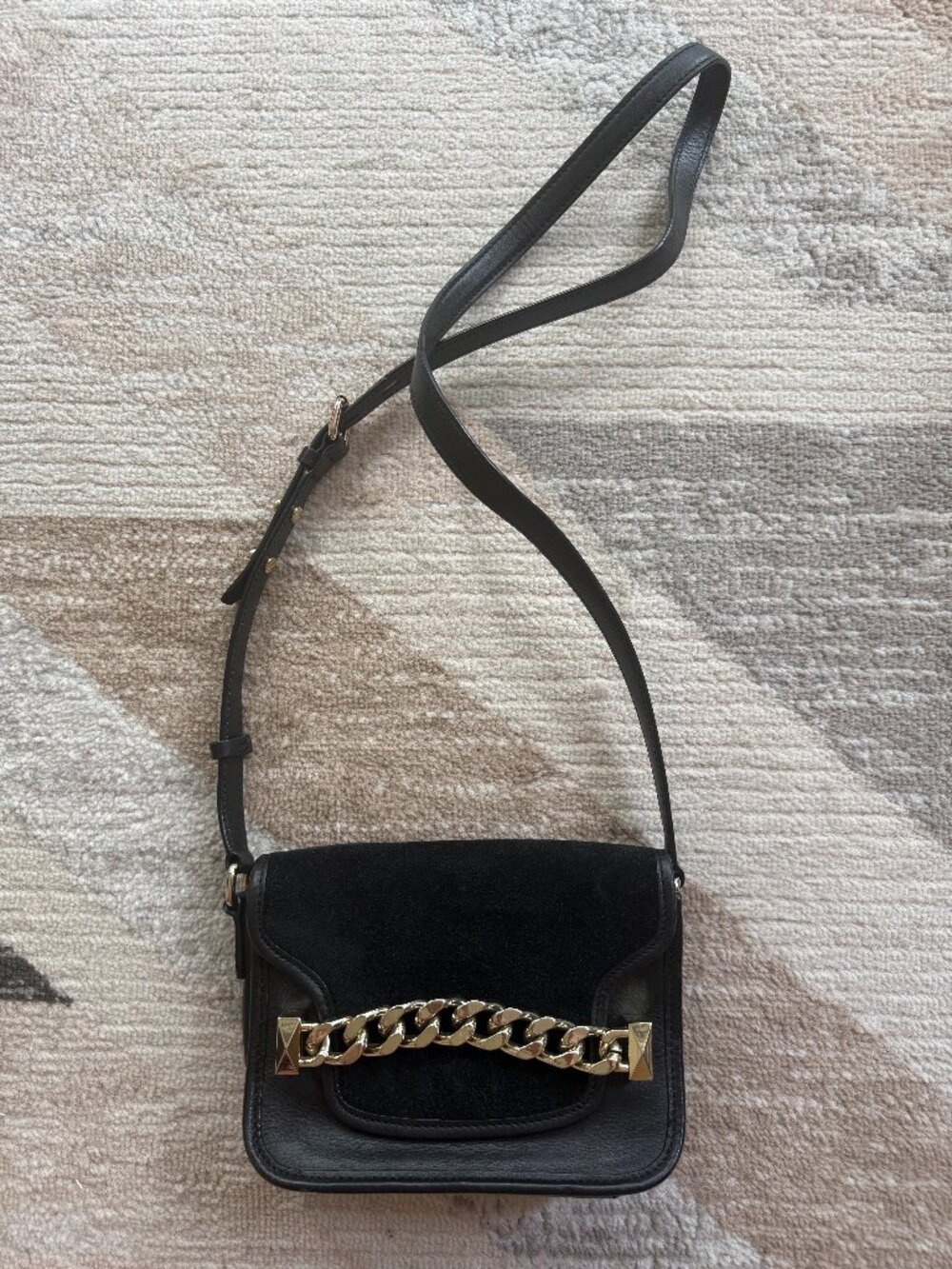Karl Lagerfeld black crossbody bag crafted from genuine leather and natural sued